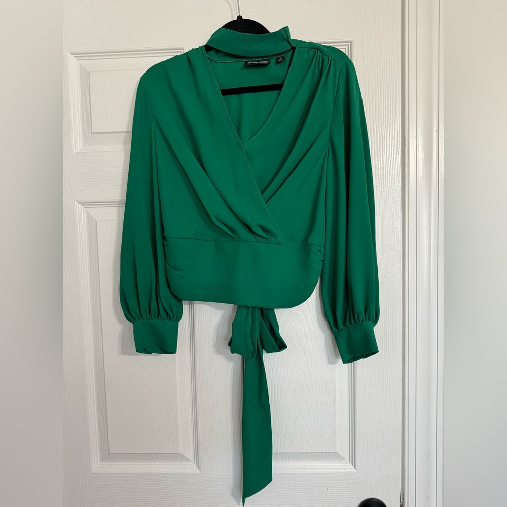 New York and Company, green blouse. Size S. Ties and back with small opening.